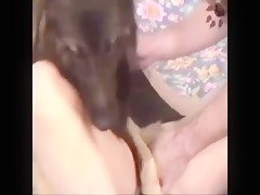 Two teen woman blowing dog cock
